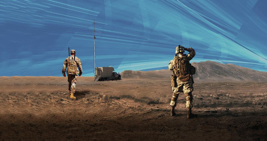 Two soldiers stand on the battlefield surveying the landscape