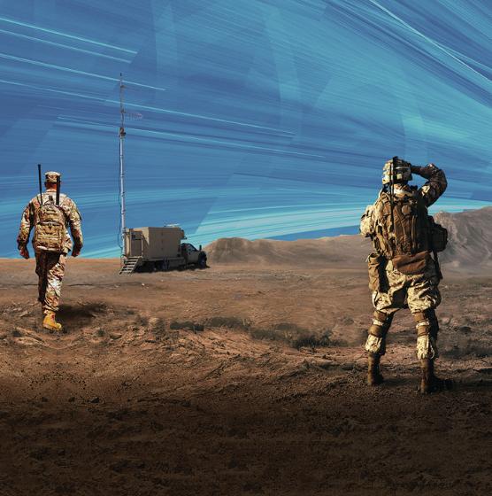 Two soldiers on the battlefield surveying the landscape