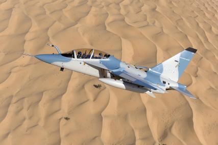 The X616 in flight over the desert at the 2011 Dubai Air Show