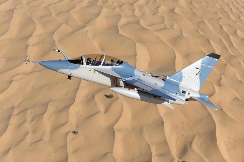 The X616 in flight over the desert at the 2011 Dubai Air Show