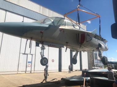 Another view of the X616 being loaded onto an oversize load vehicle for transportation to Volandia